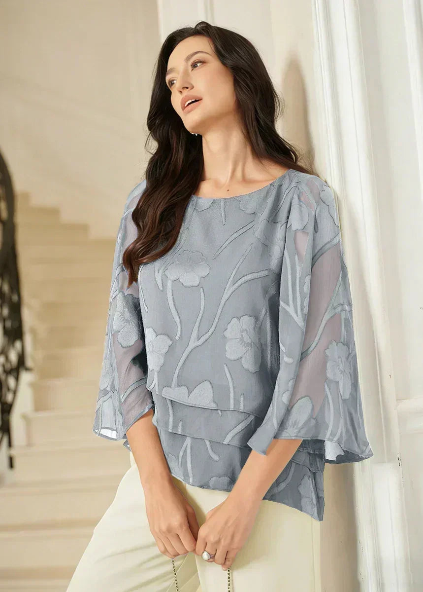 Blusa tipo capa de gasa floral