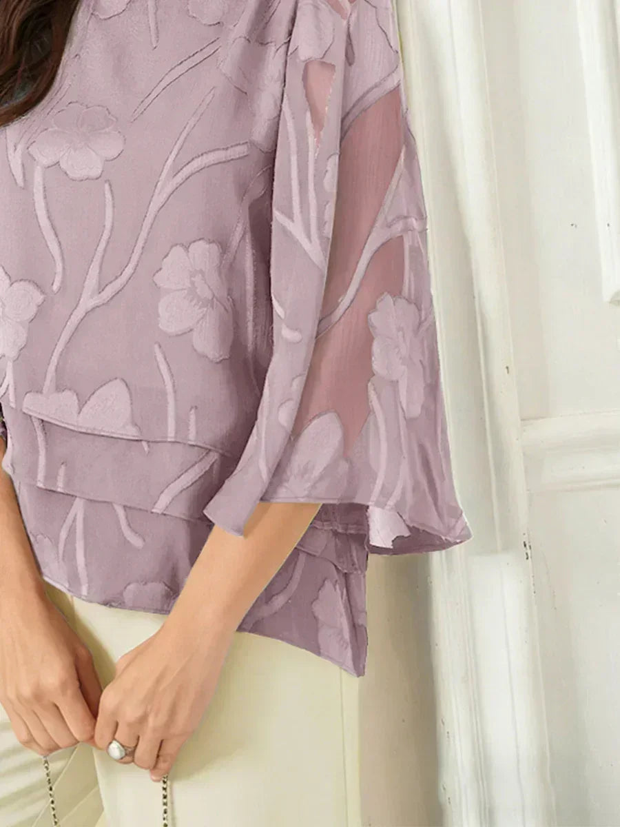Blusa tipo capa de gasa floral