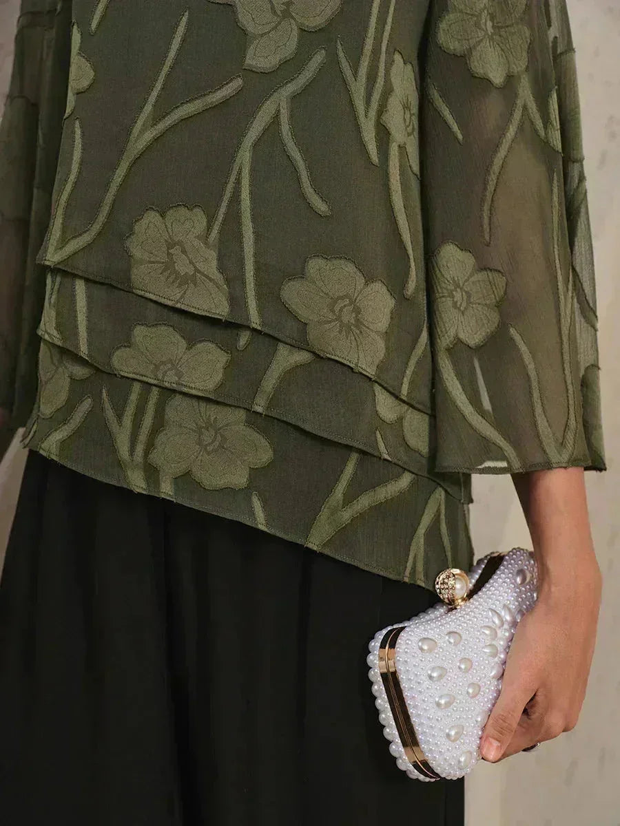 Blusa tipo capa de gasa floral