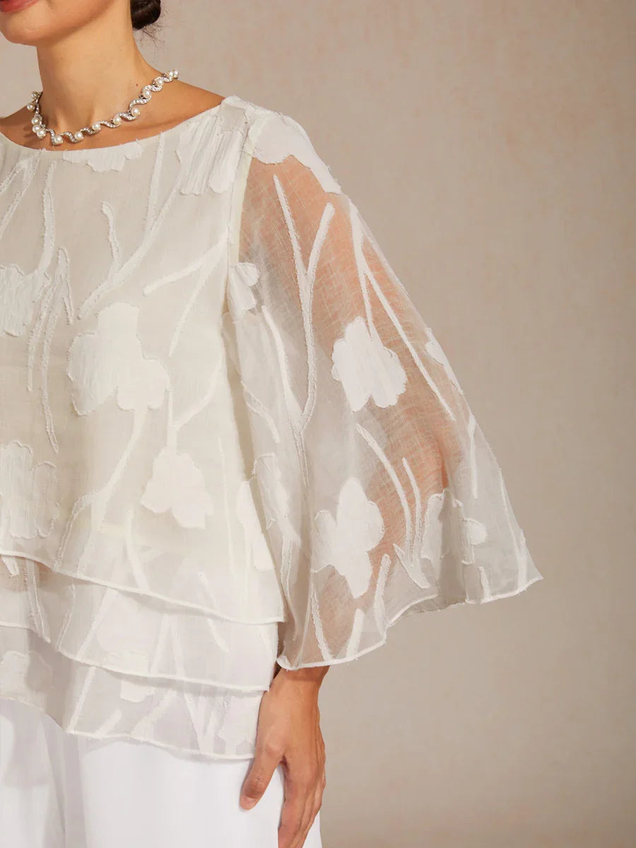 Blusa tipo capa de gasa floral