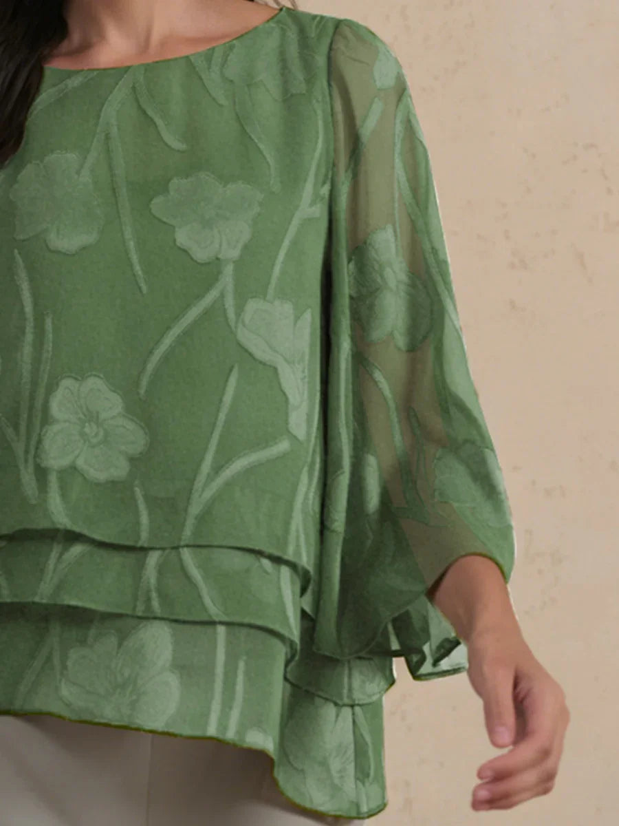 Blusa tipo capa de gasa floral