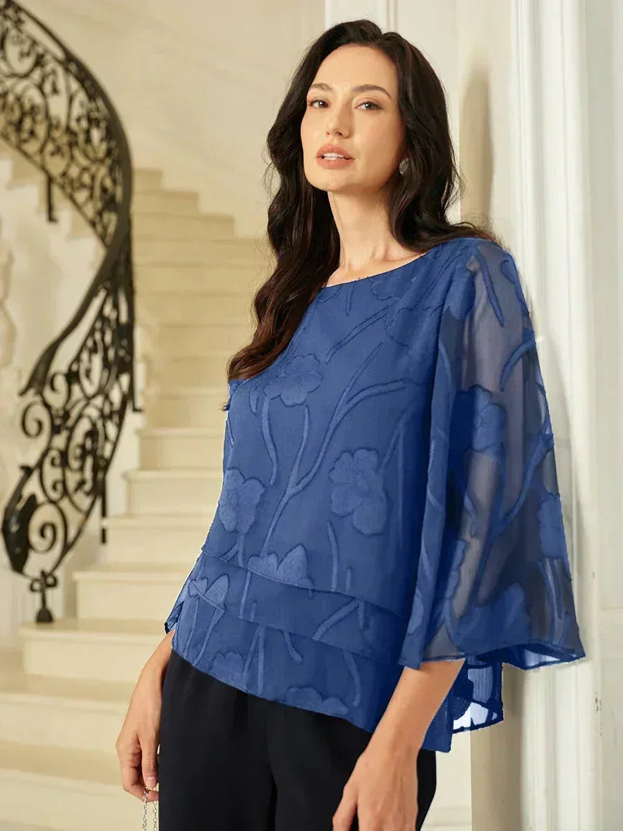 Blusa tipo capa de gasa floral